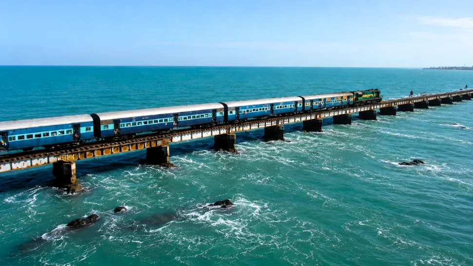Kanyakumari Thiruvananthapuram train route coconut groves coastline